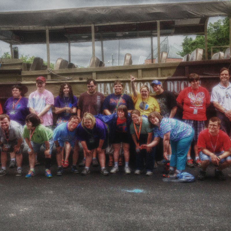 Family in front of a boat